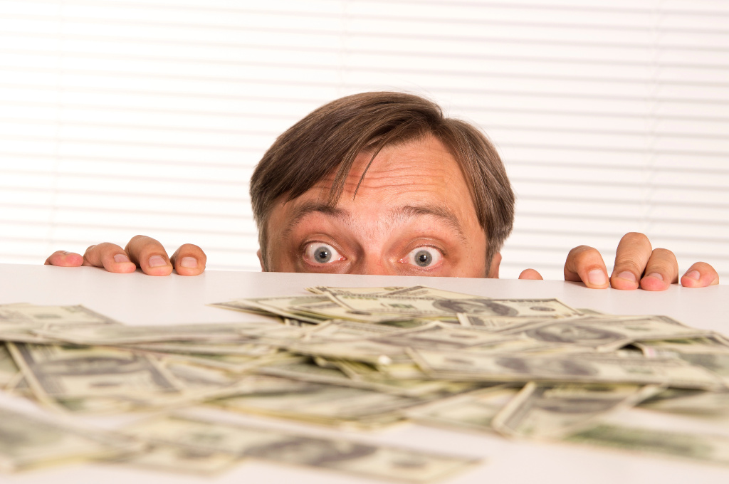 Das grosse Zittern der Geldelite Geld Banknoten Scheine Mann Reich Geschäftsmann