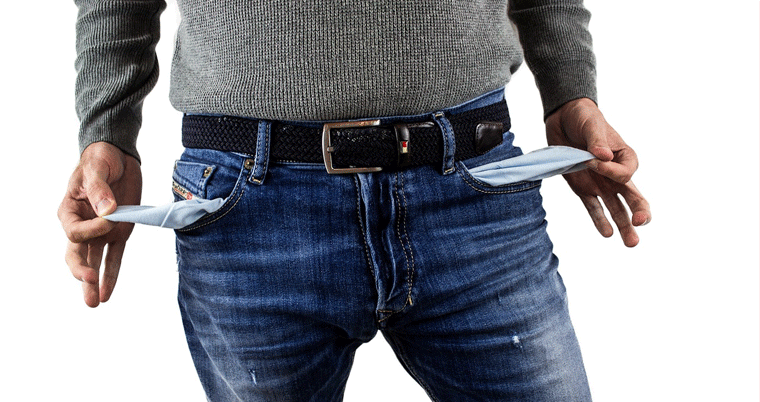 Arm und Pleite: Mann mit Jeans symbolisiert Konkurs und Bankrott